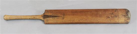 A 1920s A.W. Cochrane giant size Champion cricket bat, made for advertising purposes, 4ft 6in.